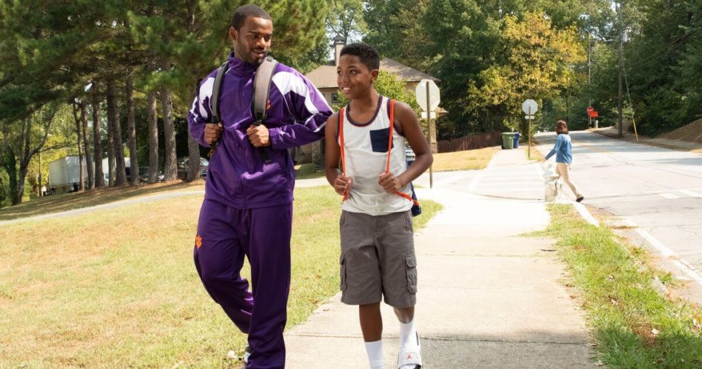 Photo still from the Disney+ movie, Safety. From left to right: Jay Reeves as Ray Ray and Thaddeus J. Mixson II as Fahmarr.