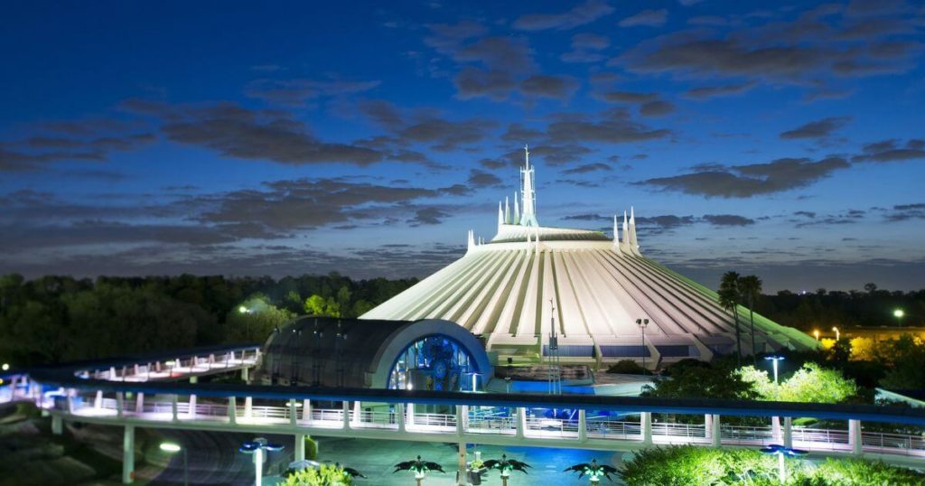 Photo of Space Mountain at Magic Kingdom in Disney World taken at night.