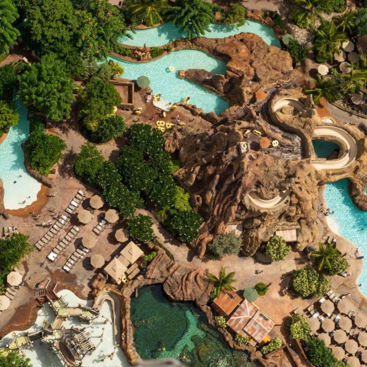 Aerial photo of the pool complex, including the waterslides, at Aulani Resort in Hawaii.