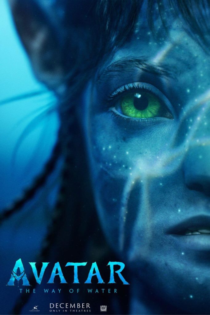 Promotional poster for Avatar: The Way of Water, featuring half the face of Kiri, one of the new characters.