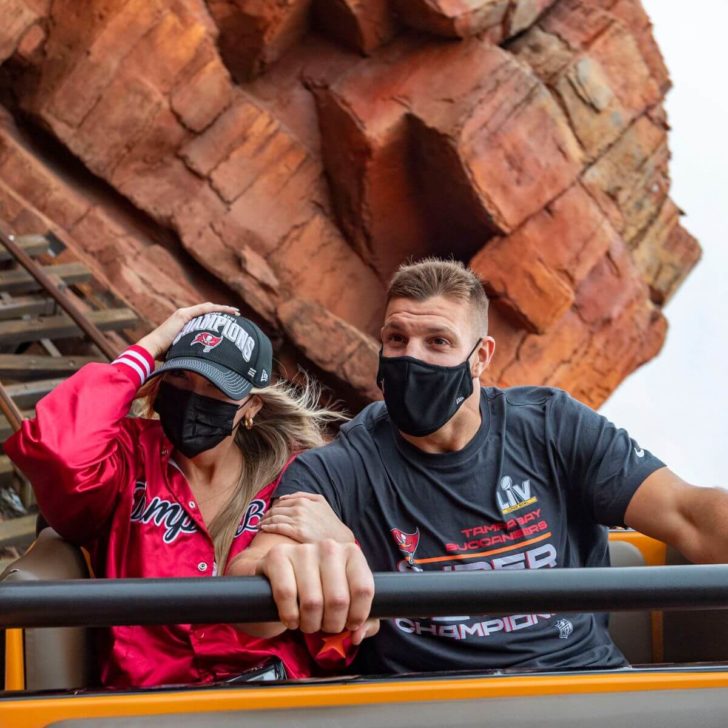 Tampa Bay Buccaneers tight end Rob Gronkowski (right) and fiancée Camille Kostek (left) ride Big Thunder Mountain Railroad in Magic Kingdom.