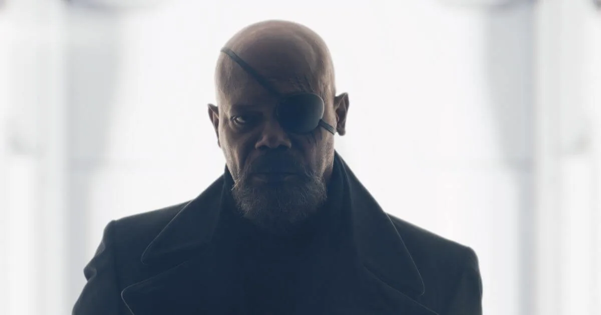 Closeup photo of Nick Fury with his iconic eye patch and a black trench coat.