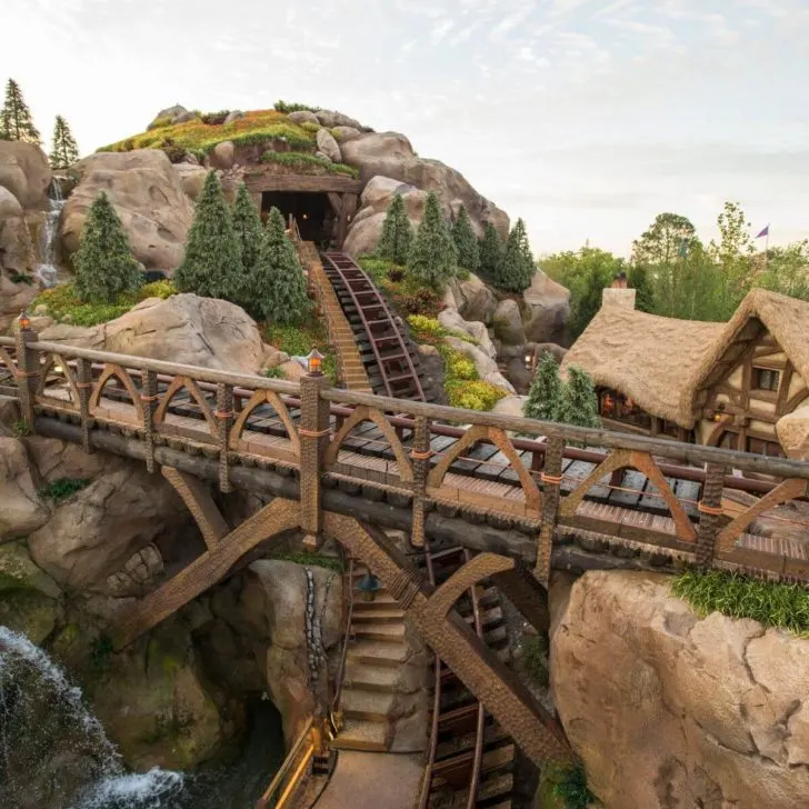 Photo of a walkway that crosses over the track of Seven Dwarfs Mine Train at Magic Kingdom in Disney World.