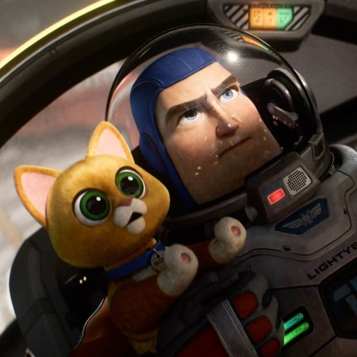 Photo still from Pixar's Light year, with Sox the cat on the left, and Buzz Lightyear on the right.