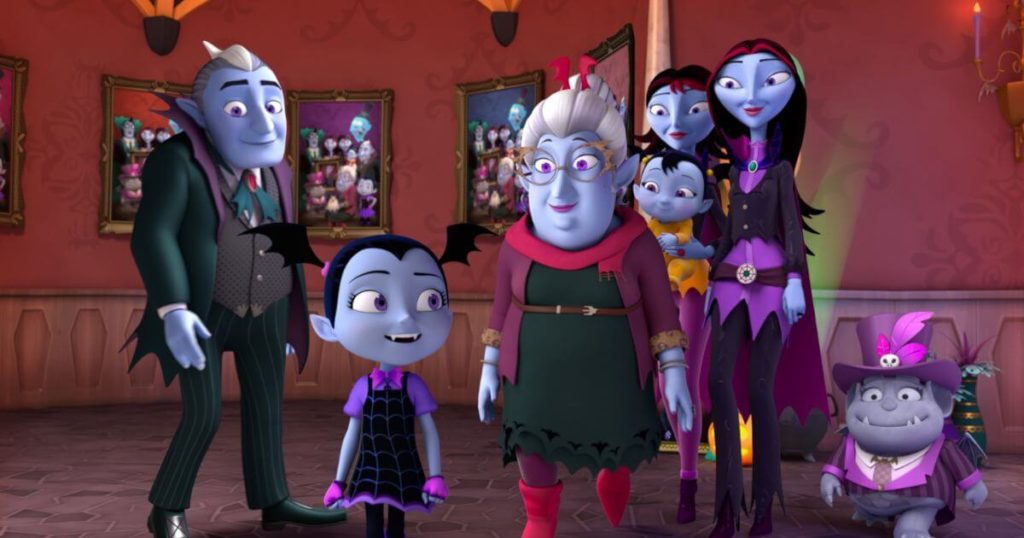 Photo still from the Disney Junior show, Vampirina, with Vampirina and her family.