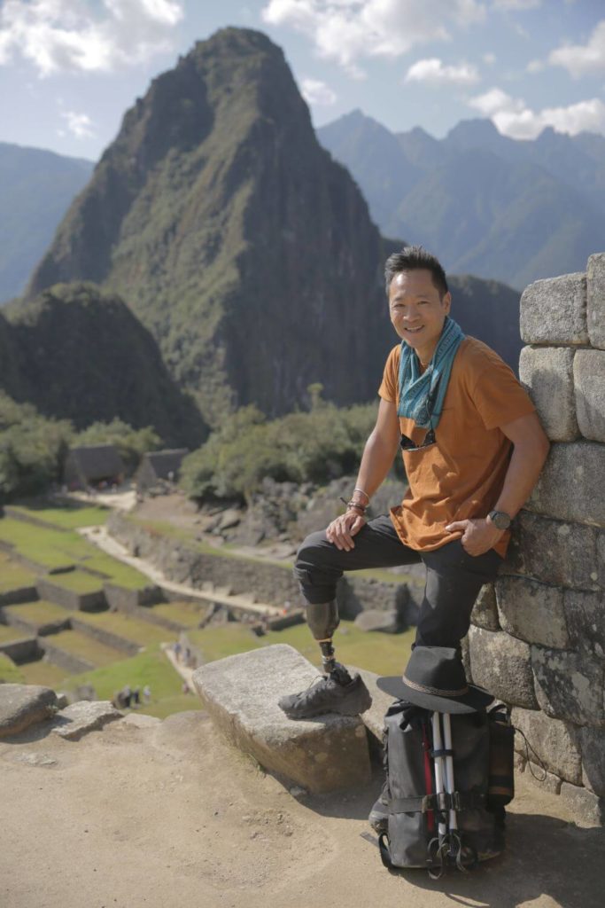 Albert Lin posing at Machu Picchu.