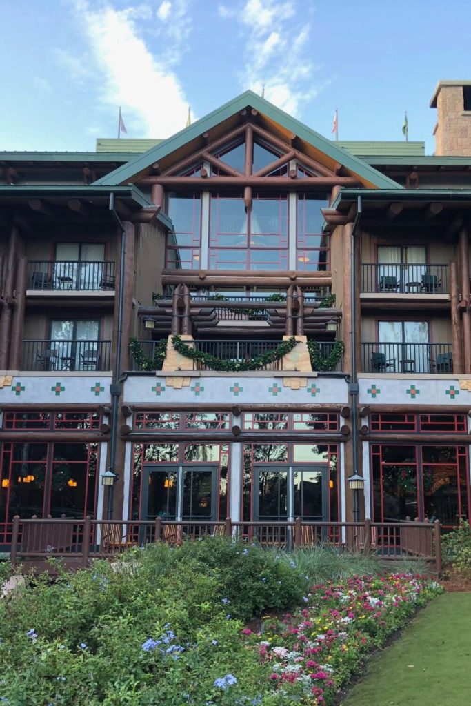 Photo of the back entrance to the Wilderness Lodge at Disney World with Christmas decor up.