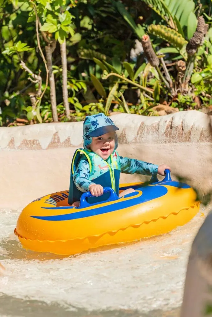 Photo of a young boy in a tube going down a water slide at Typhoon Lagoon.