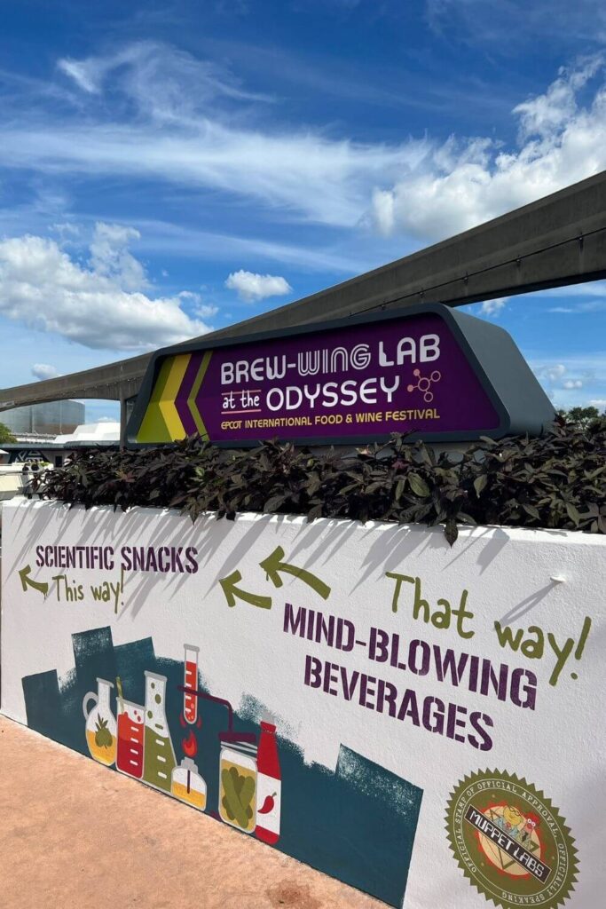 Photo of signage pointing guests to the Brew-Wing Lab at the Odyssey at Epcot.