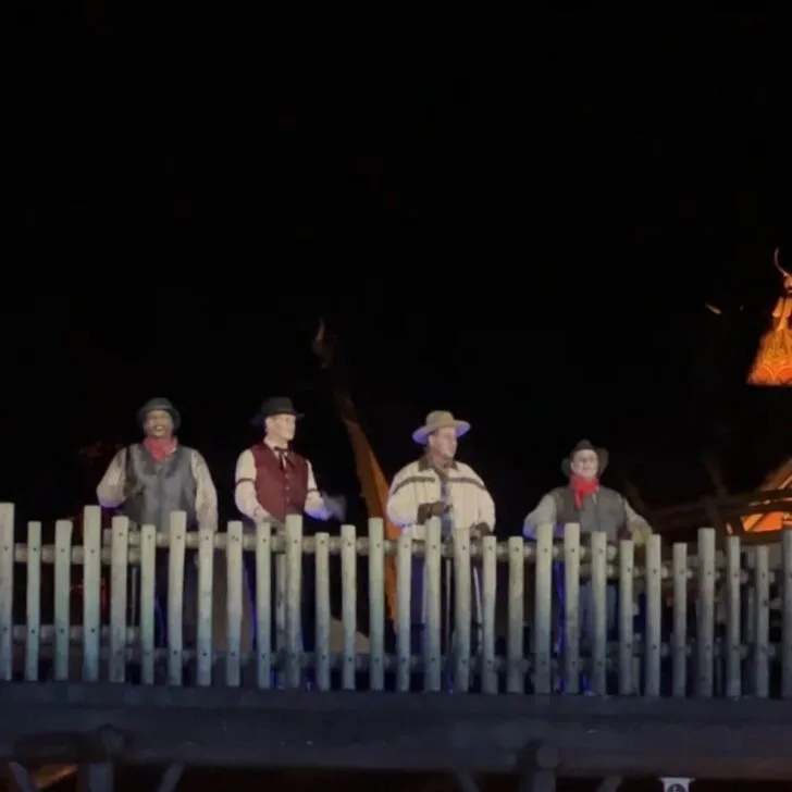 Photo of the Cadaver Dans quartet singing in Frontierland at Magic Kingdom.