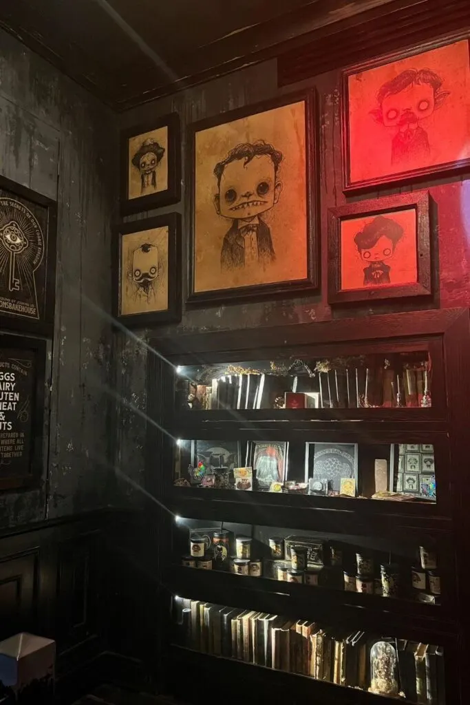 Photo of the interior of Gideon's Bakehouse with lots of creepy memorabilia and sketches.