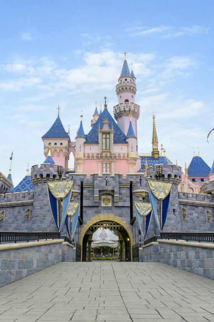 Photo of Sleeping Beauty's castle at Disneyland, looking straight through the archway toward Fantasyland.