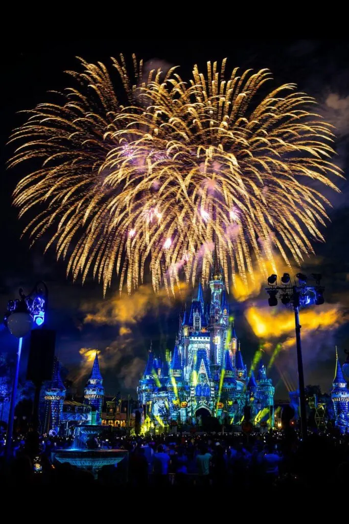 Photo of Disney's Not-So-Spooky Spectacular fireworks show Mickey's Not-So-Scary Halloween Party, with Cinderella's castle all lit up from.