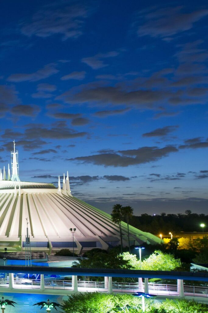 Photo of the exterior of Space Mountain at Magic Kingdom at night.