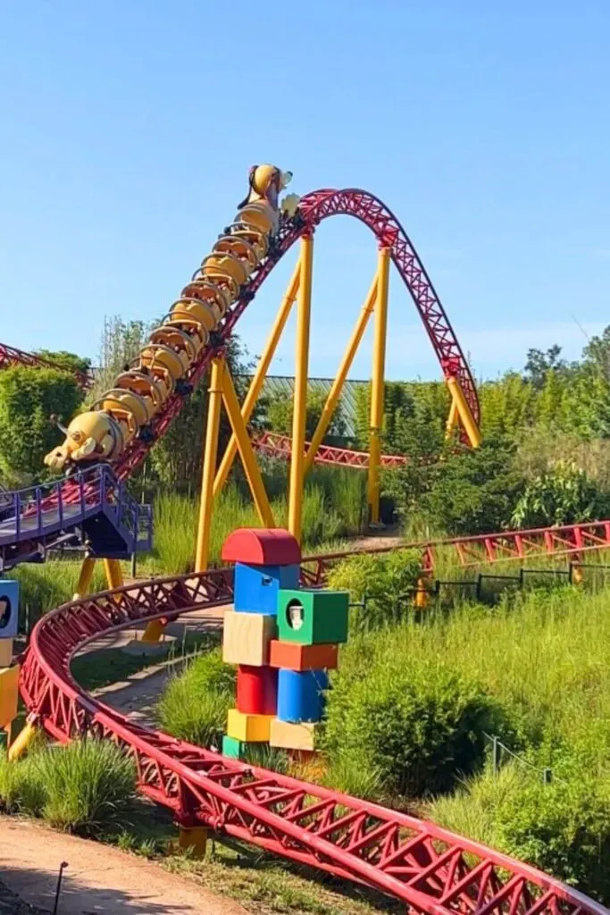 Photo of the Slinky Dog Dash roller coaster with a ride car going up a hill.