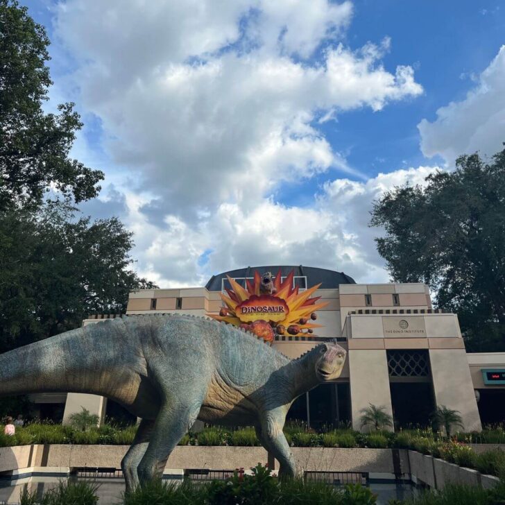 Photo of the entrance to Dinosaur with a giant dinosaur statue out front.