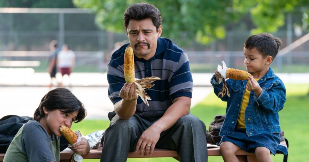 Photo still from the biopic, Flamin' Hot, featuring (L-R) Hunter Jones, Jesse Garcia and Brice Gonzalez.