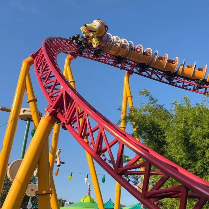 Photo of Slinky Dog Dash roller coaster, preparing to go down a big drop.