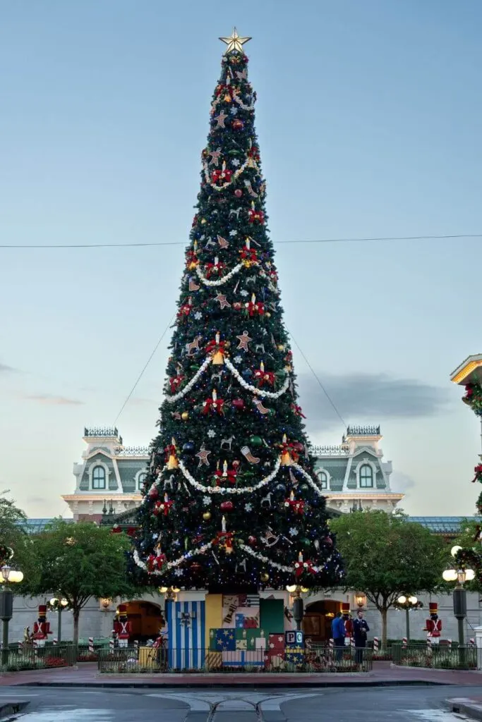 Photo of the main Christmas tree at Magic Kingdom, near the main entrance.