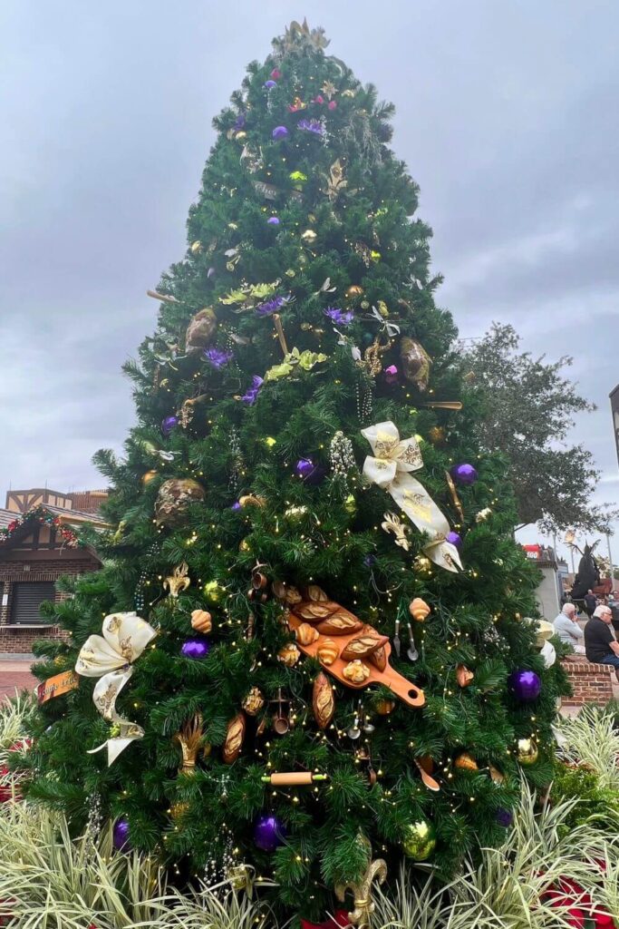 Photo of a Princess & the Frog inspired Christmas tree in Disney Springs at Disney World.