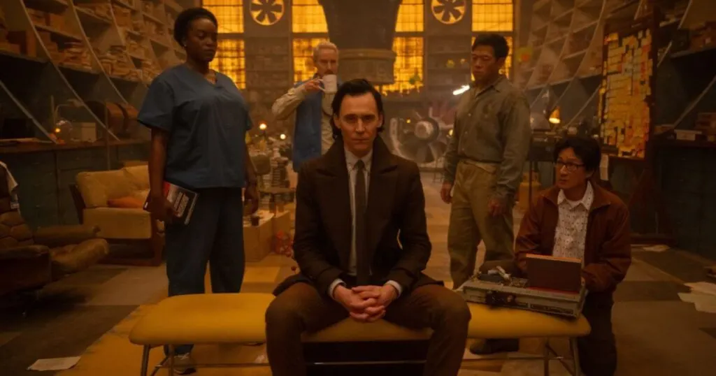 Photo still of (L-R): Wunmi Mosaku as Hunter B-15, Owen Wilson as Mobius, Tom Hiddleston as Loki, Eugene Cordero as Casey, and Ke Huy Quan as O.B. in Marvel Studios' LOKI, Season 2, episode 5, gathered in the lab of A.D. Doug, aka Ouroboros.