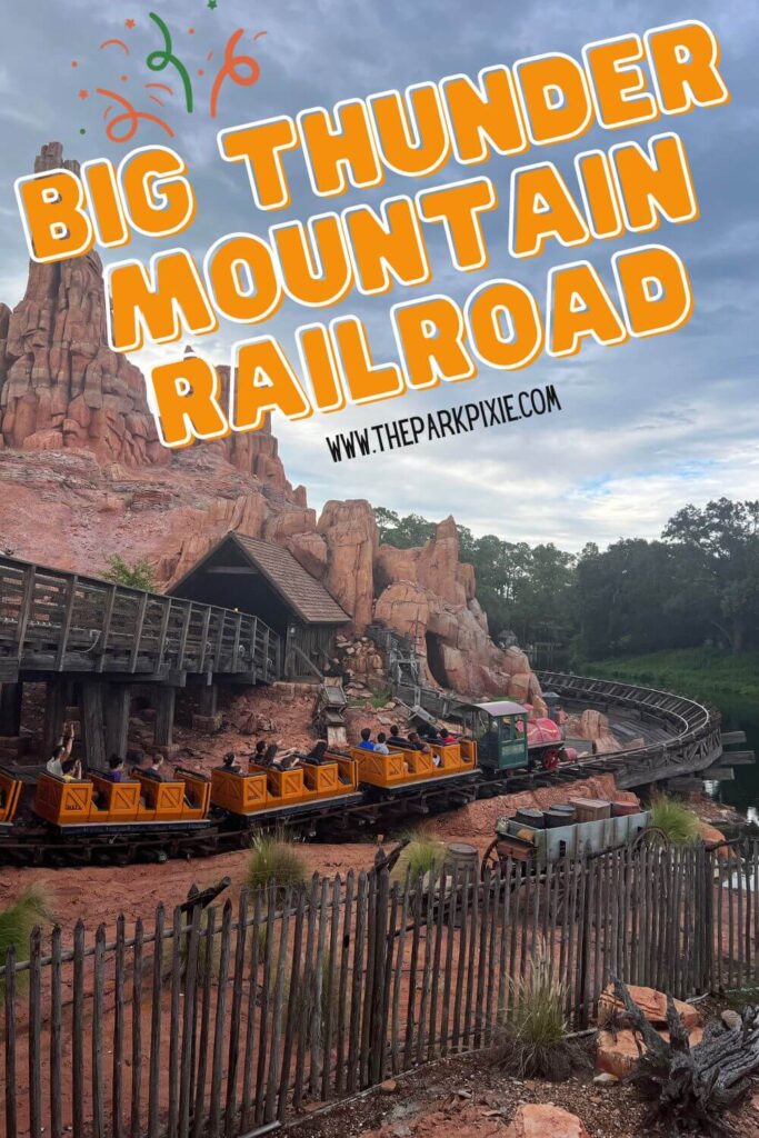 Photo of a train going by on Big Thunder Mountain Railroad roller coaster.