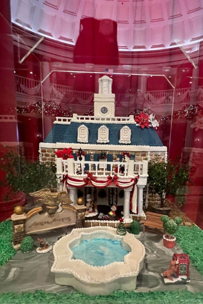 Photo of a miniature recreation of the American Adventure pavilion building at Epcot, made out of gingerbread.