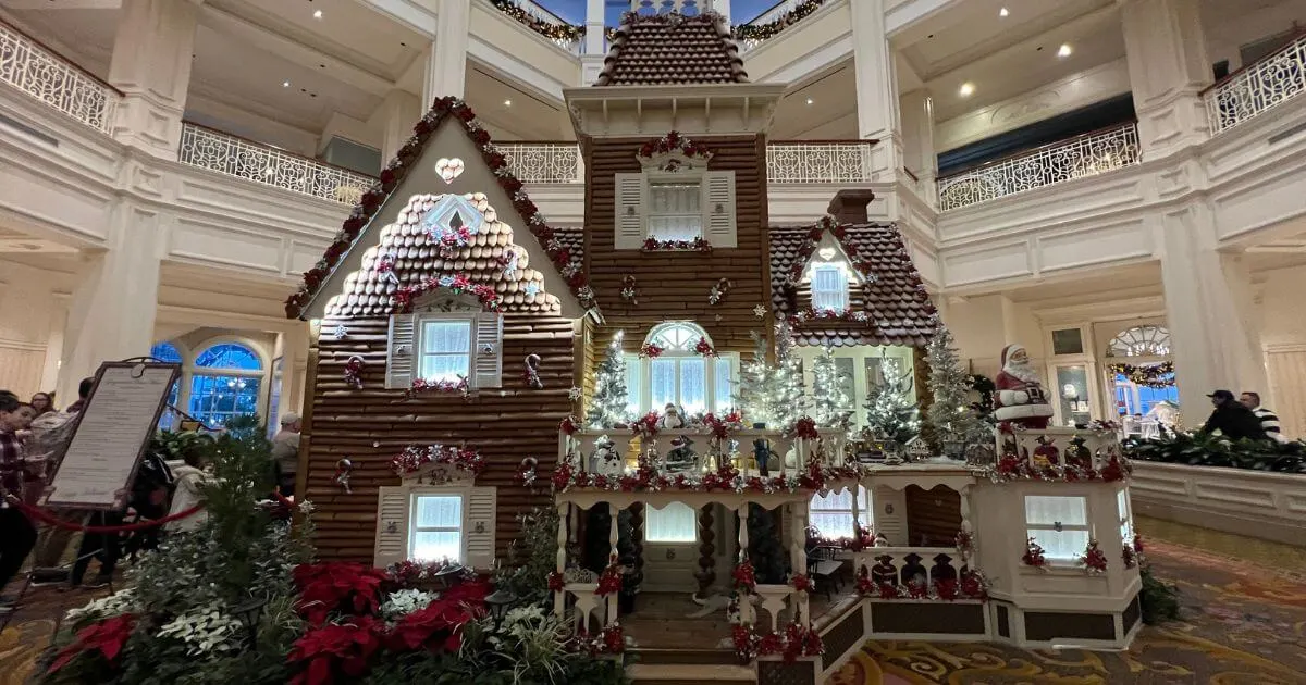 Horizontal photo of the 2023 Grand Floridian gingerbread house in the resort lobby.