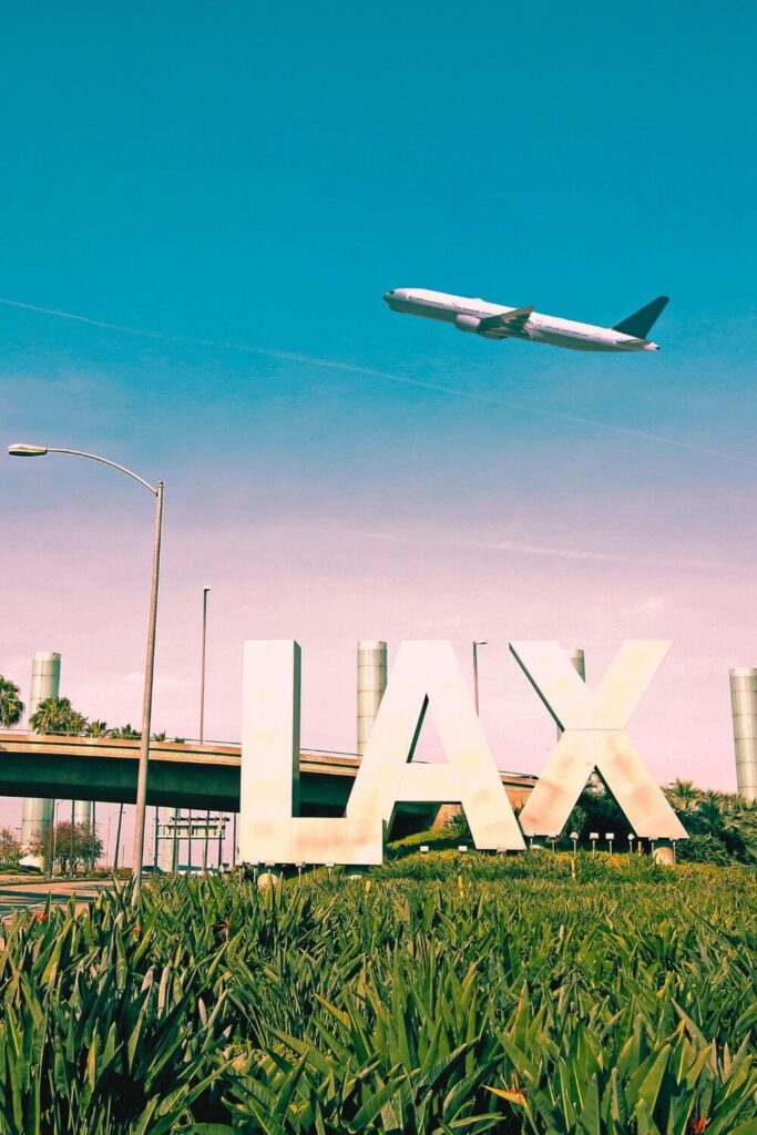 Photo of a plane taking off at LAX airport.