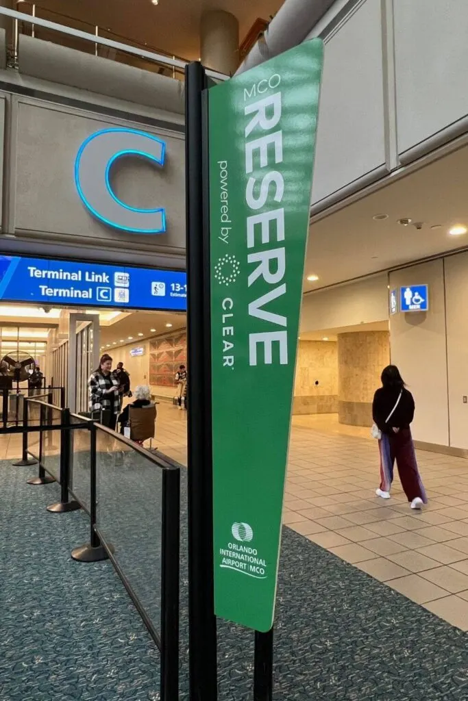 Photo of signage for MCO Reserve powered by Clear at Orlando Airport's Terminal C.