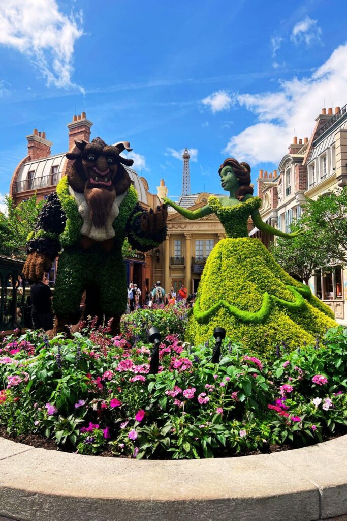Photo of a Beauty & the Beast topiary at Epcot.