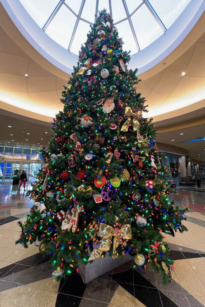 Photo of a Christmas tree in the lobby of Pop Century Resort at Disney World.