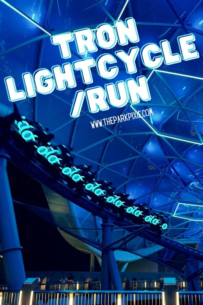 Photo of TRON Lightcycle Run at Magic Kingdom at night, with everything lit up in blue.