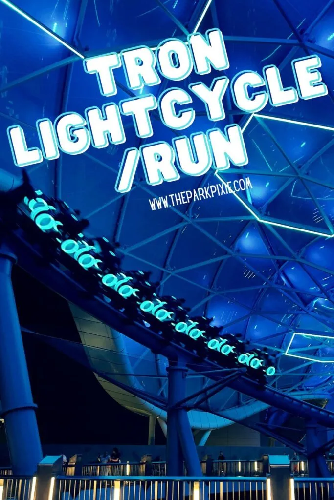 Photo of TRON Lightcycle Run at Magic Kingdom at night, with everything lit up in blue.