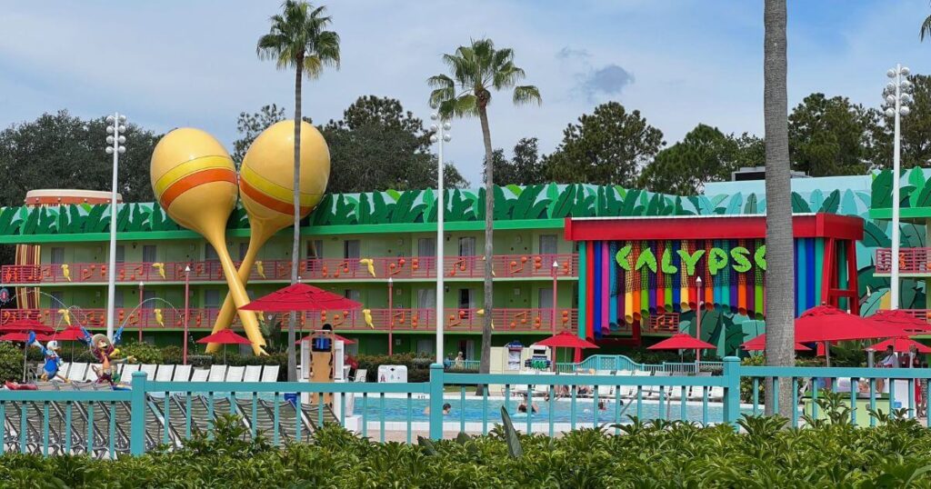 Horizontal photo of the Calypso Pool at Disney's All-Star Music Resort with giant maracas and a marimba in the background.