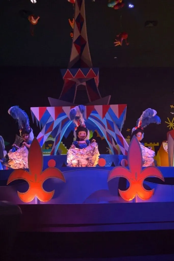 Photo of the France dolls dancing the Can Can on in front of the Eiffel Tower on the It's a Small World ride.
