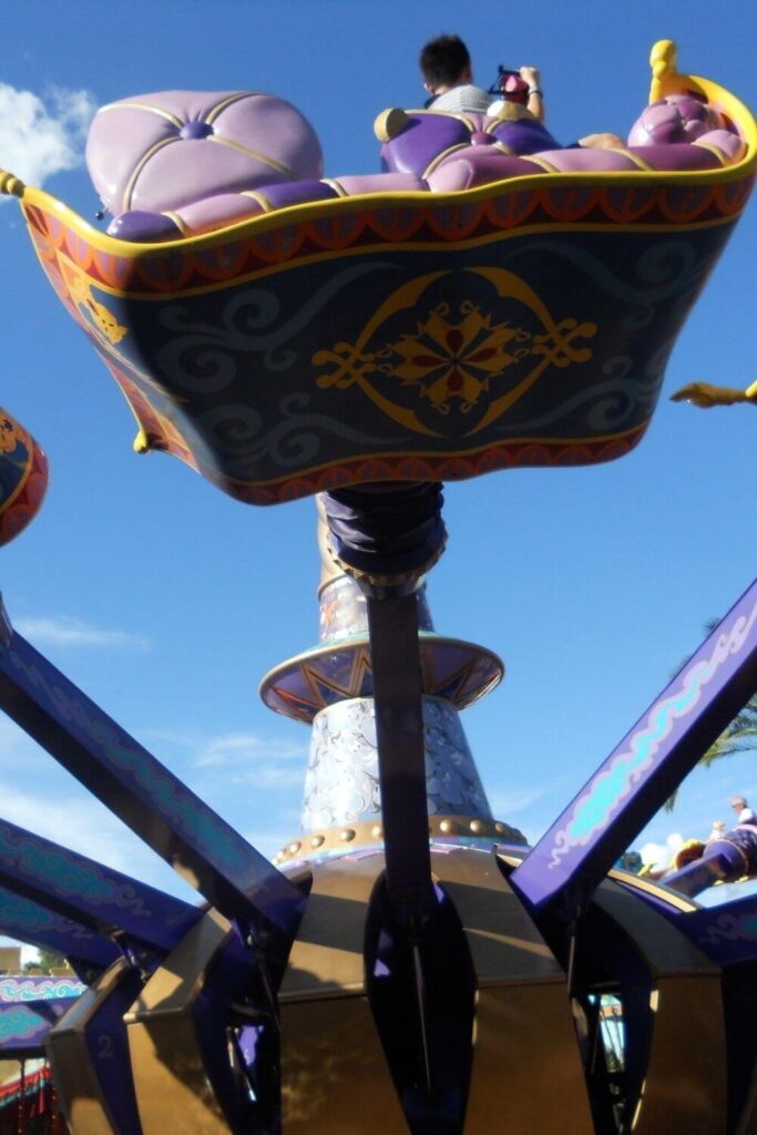 Photo of the Magic Carpets of Aladdin ride in action.