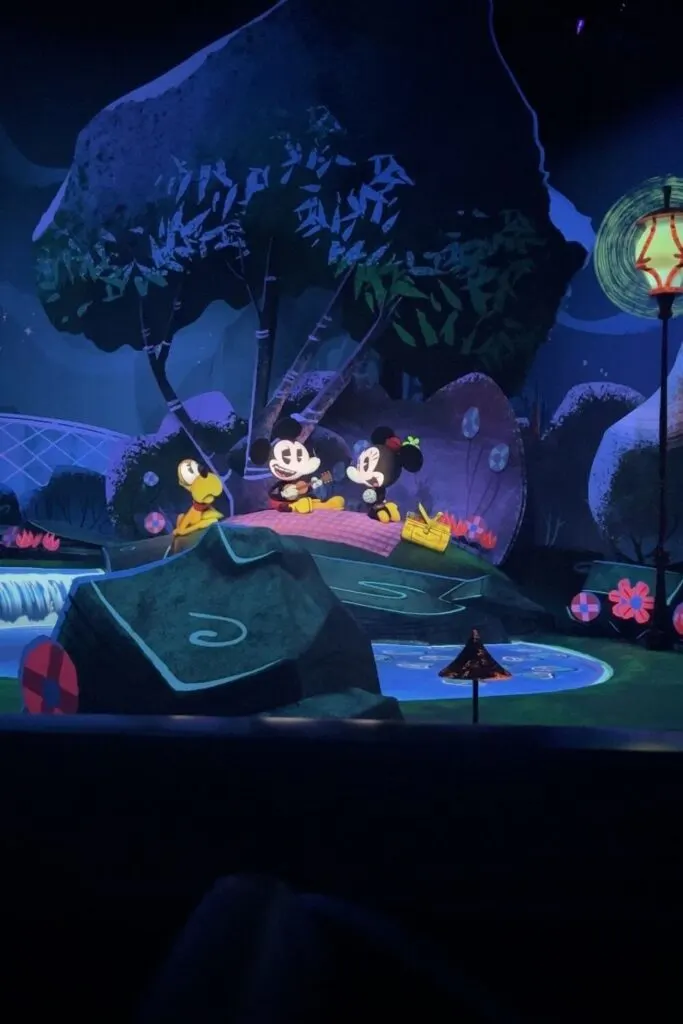 Photo of a picnic scene with Mickey, Minnie, and Pluto in Mickey & Minnie's Runaway Railway ride.