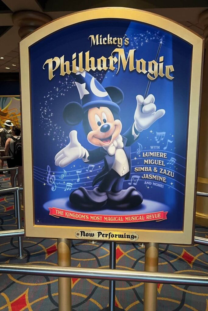 Photo of a sign for Mickey's PhilharMagic show in Magic Kingdom's Fantasyland.
