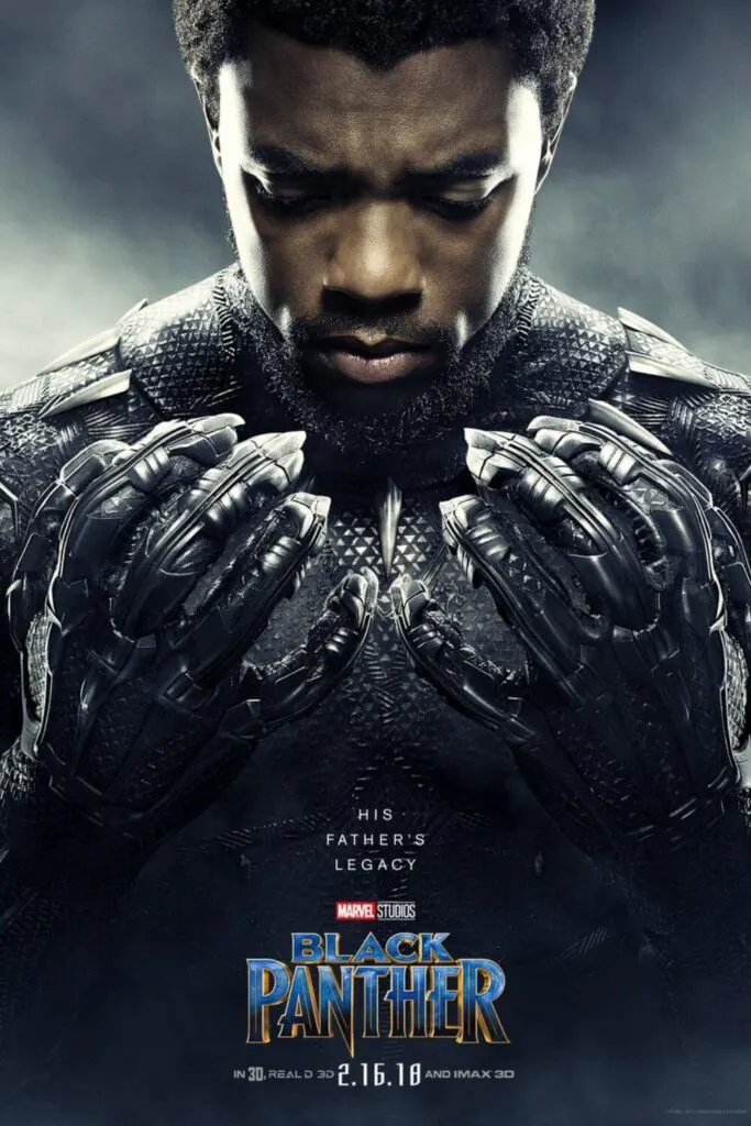Promotional poster for Marvel's Black Panther, featuring Chadwick Boseman as the titular character, holding his clawed hands up against his chest.