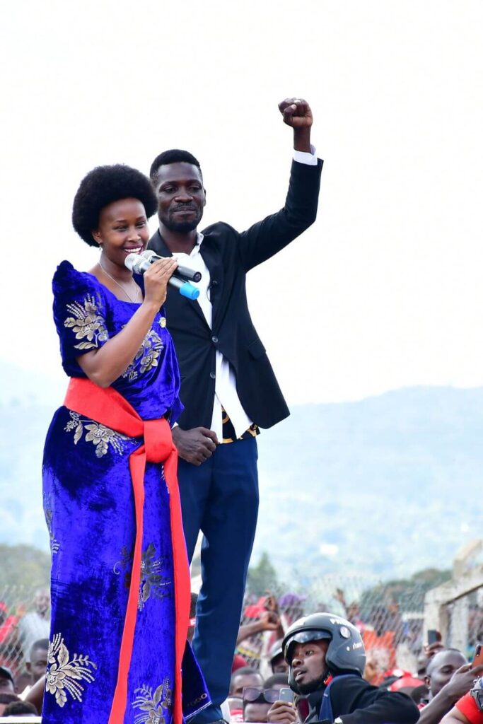 Bobi Wine on top of his vehicle with his wife Barbara ltungo Kyagulanyi as they campaigned in Kasanda district, Central Uganda on November 27, 2020.