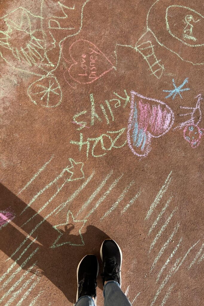 Photo of chalk drawings on the sidewalk at Epcot during the Festival of the Arts.