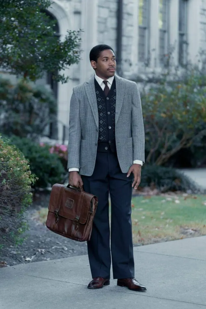 Photo still of Martin Luther King Jr., played by Kelvin Harrison Jr., at university in GENIUS: MLK/X from National Geographic.