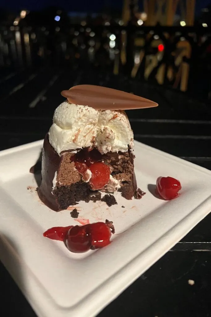 Photo of the Black Forest Cake, cut in half, from Pastoral Palette next to the Germany pavilion at Epcot.