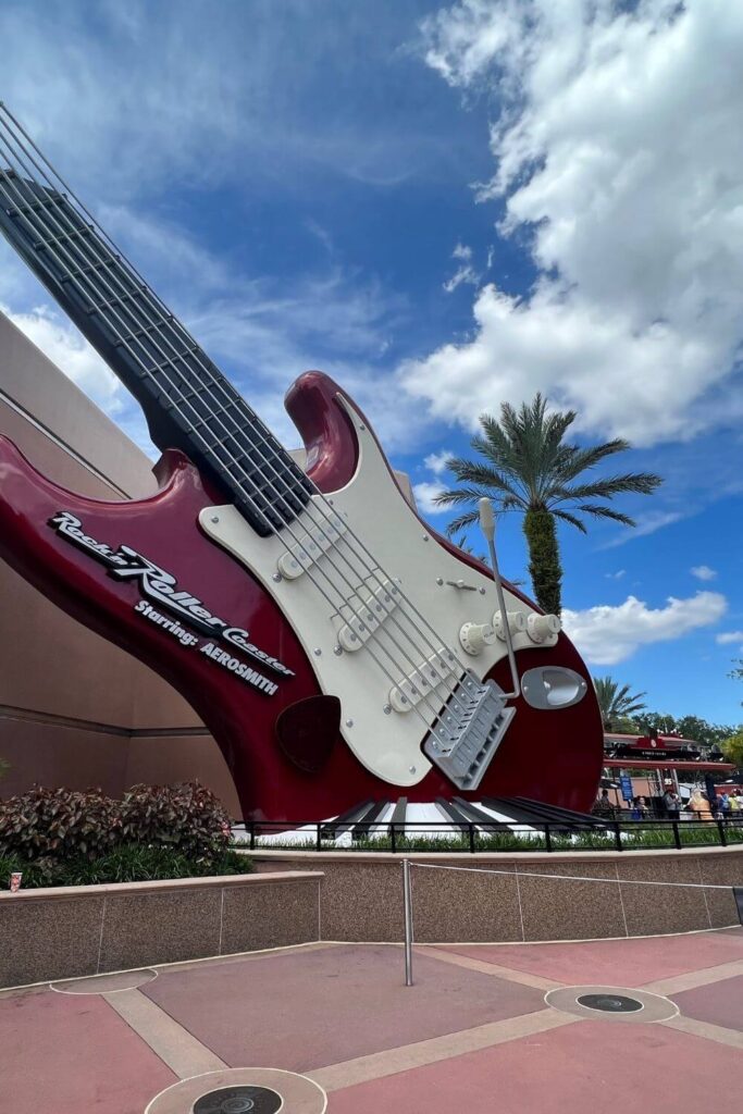 Photo of a giant red guitar outside the Rock 'n' Roller Coaster at Hollywood Studios.