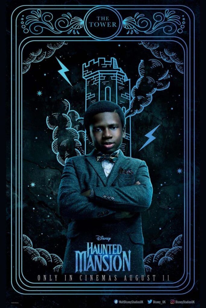 Promotional poster for the 2023 movie, Haunted Mansion, styled after The Tower tarot card, with a photo of Travis in the middle.