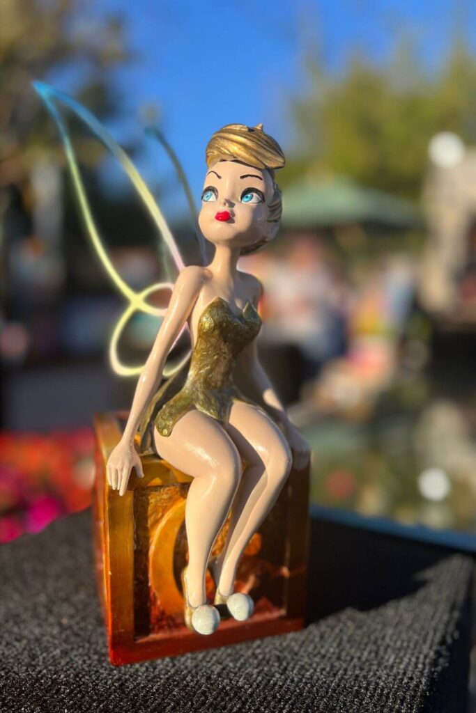 Photo of a small Tinkerbell figurine for sale at the Epcot International Festival of the Arts.