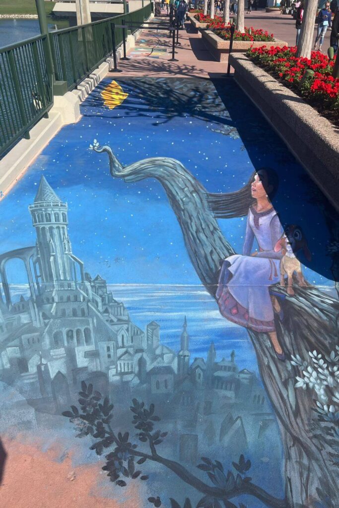 Photo of the Wish-themed perspective chalk art photo op at the Epcot Festival of the Arts.