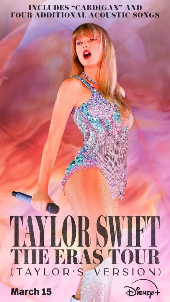 Promotional poster for Taylor Swift: The Eras Tour (Taylor's Version) featuring Taylor Swift in a silver, blue, and purple rhinestone leotard and glittery boots against a pink and peach background.