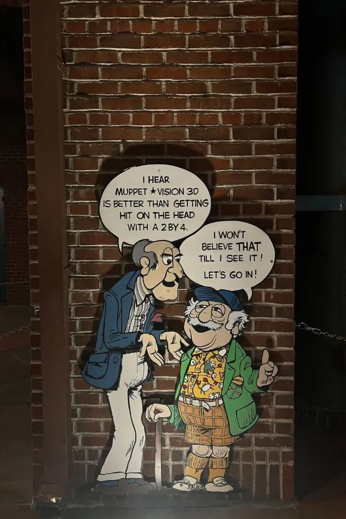 Photo of a Statler and Waldorf artwork outside Muppet-Vision 3D at Hollywood Studios.